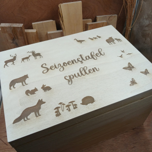 Houten bewaarkist voor seizoenstafel-spullen Houten bewaarkist voor seizoenstafel-spullen